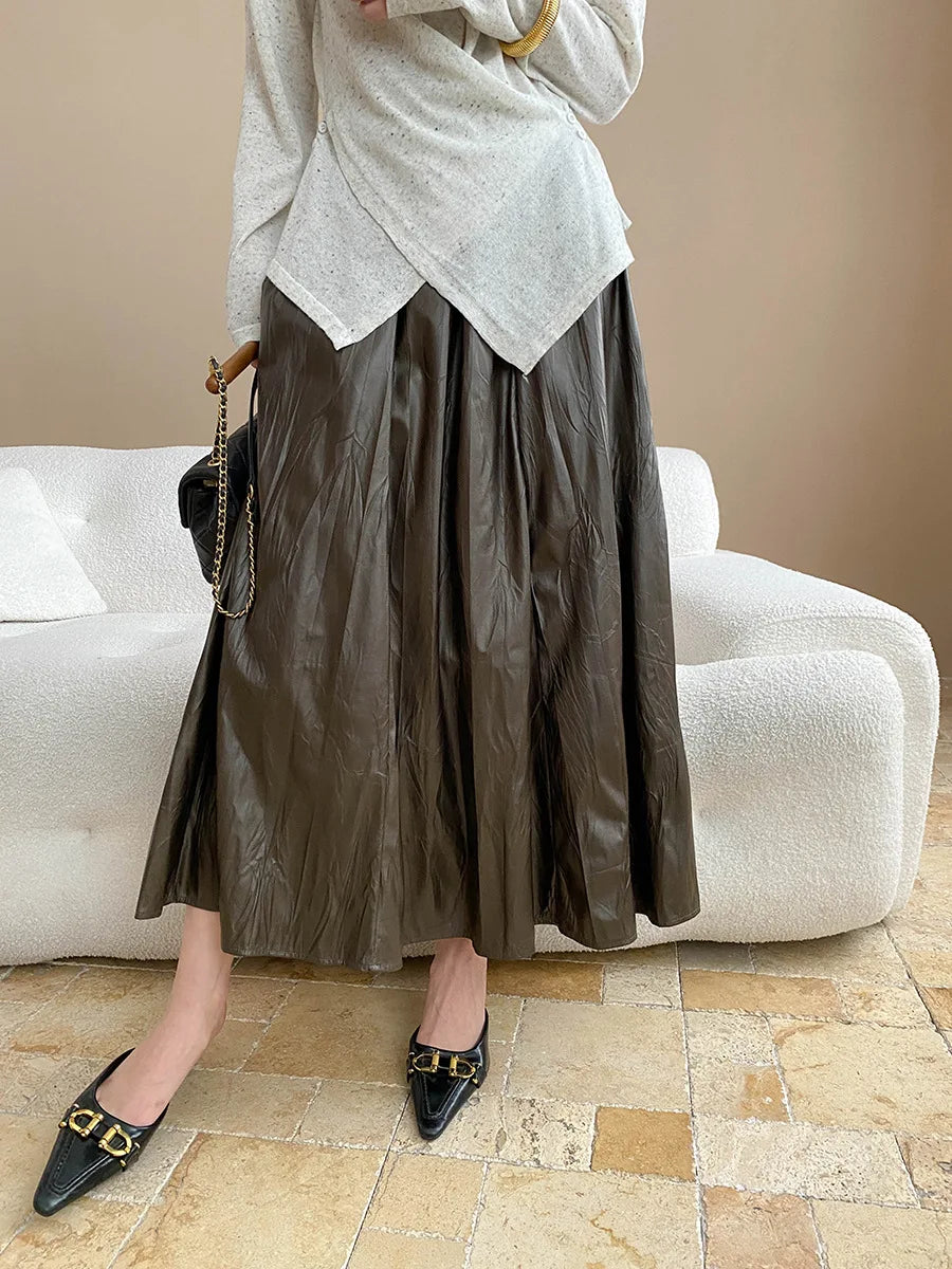 Early autumn new light luxury texture pleated PU leather elastic waist A-line leather skirt half skirt