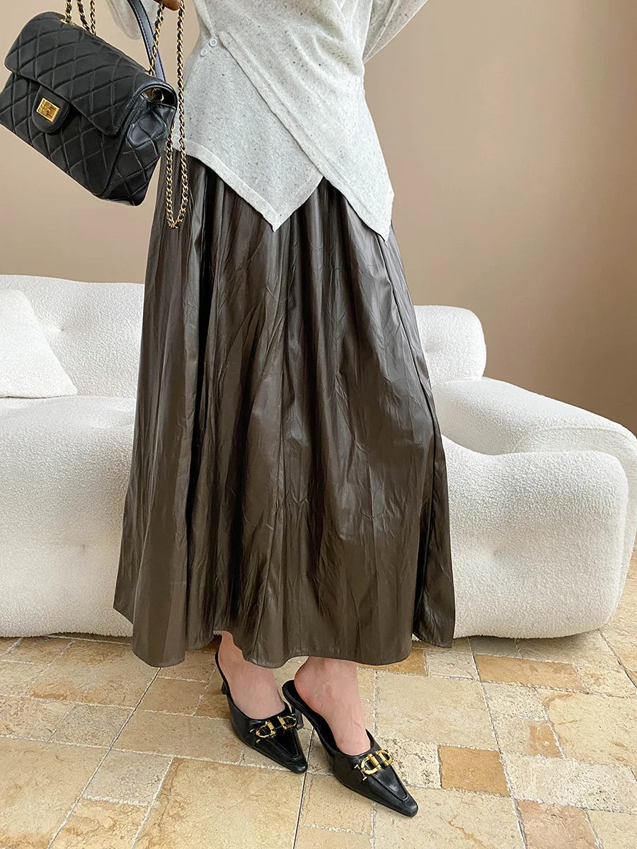 Early autumn new light luxury texture pleated PU leather elastic waist A-line leather skirt half skirt