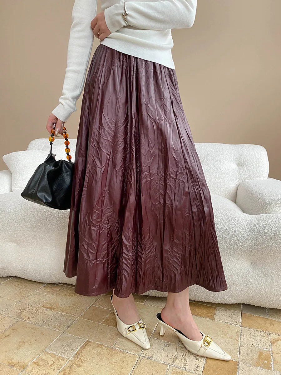 Early autumn new light luxury texture pleated PU leather elastic waist A-line leather skirt half skirt
